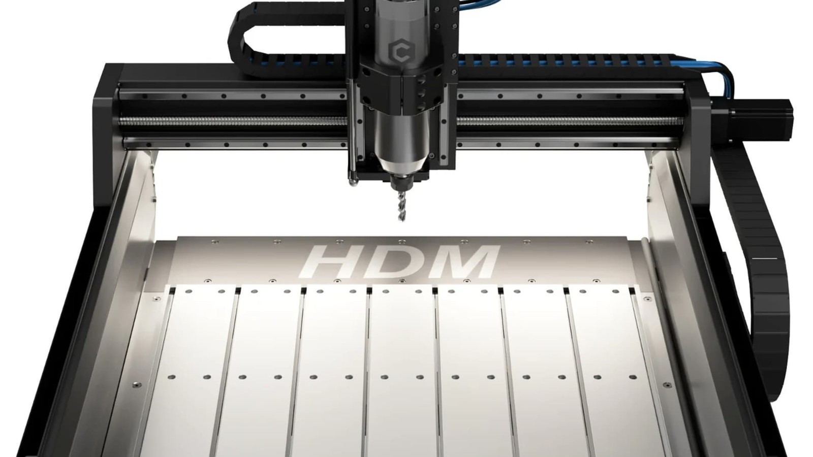 Shapeoko HDM V3 CNC router with its aluminum hybrid table, black gantry, and water-cooled spindle shown from the front