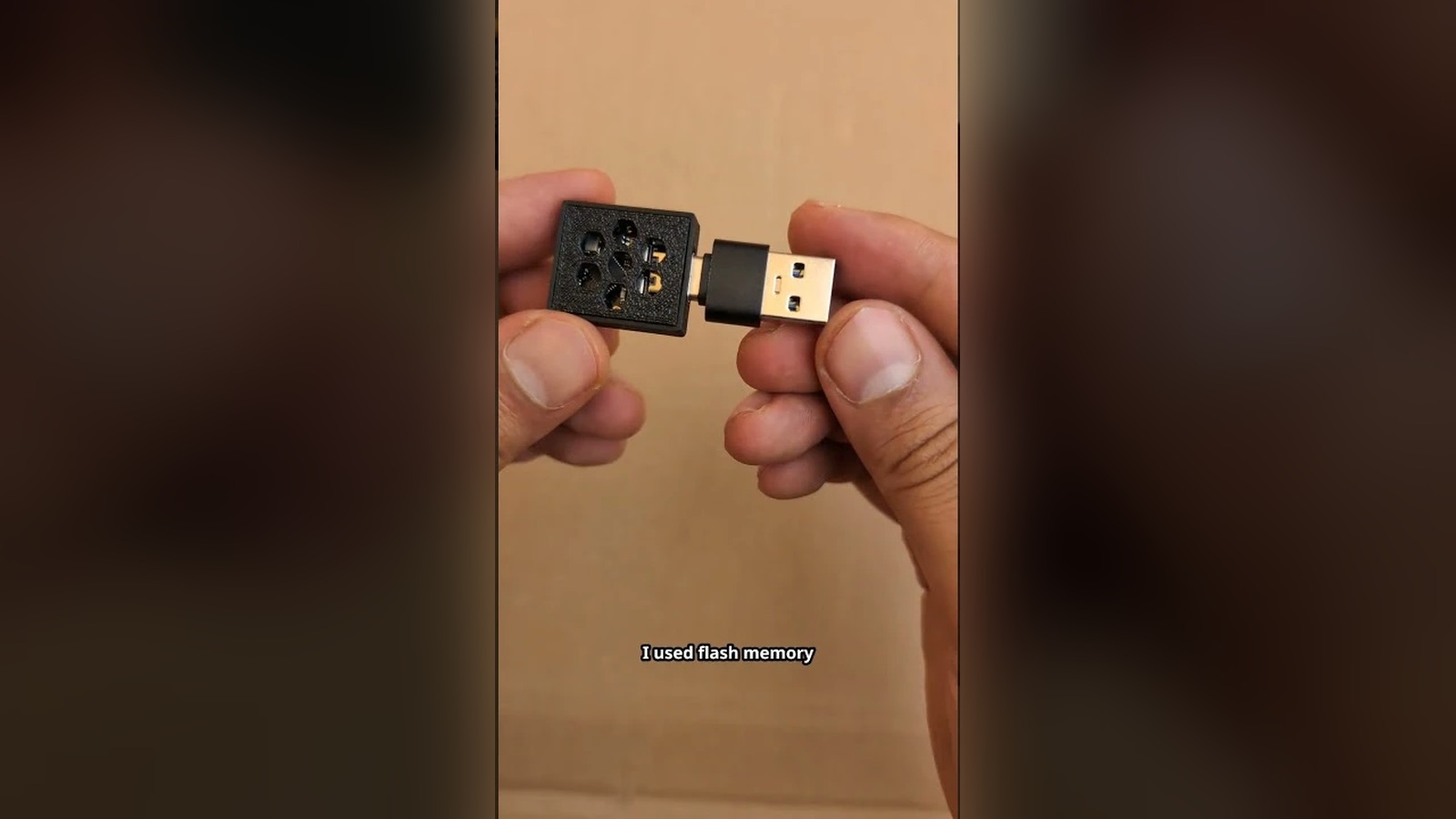 Hand holding the ESP32-C3 ad blocker board in a USB adapter