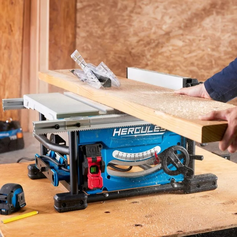A closer view of the saw's table and fence while cutting