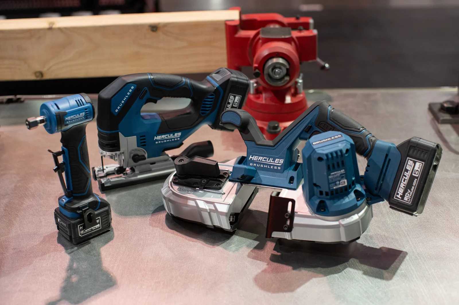 The three HERCULES tools together: die grinder, jig saw, and compact band saw