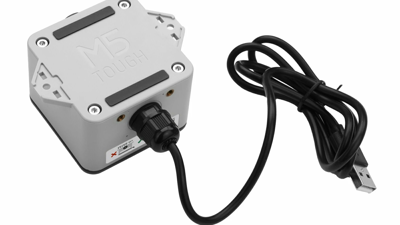 M5Stack ToughC5 controller in its gray enclosure with a cable attached