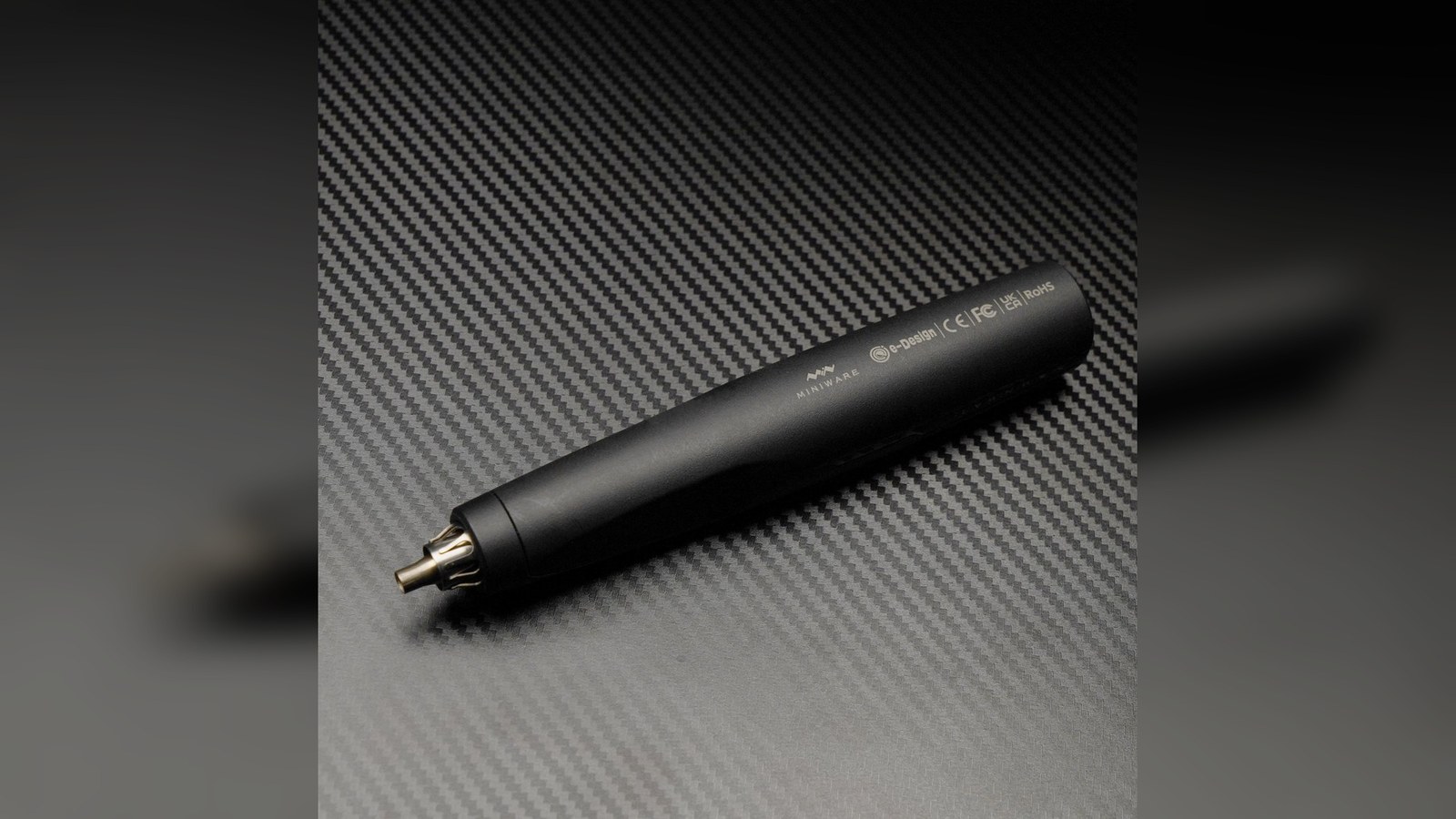 MINIWARE AirGo 140 pen-shaped hot-air gun resting on its small stand