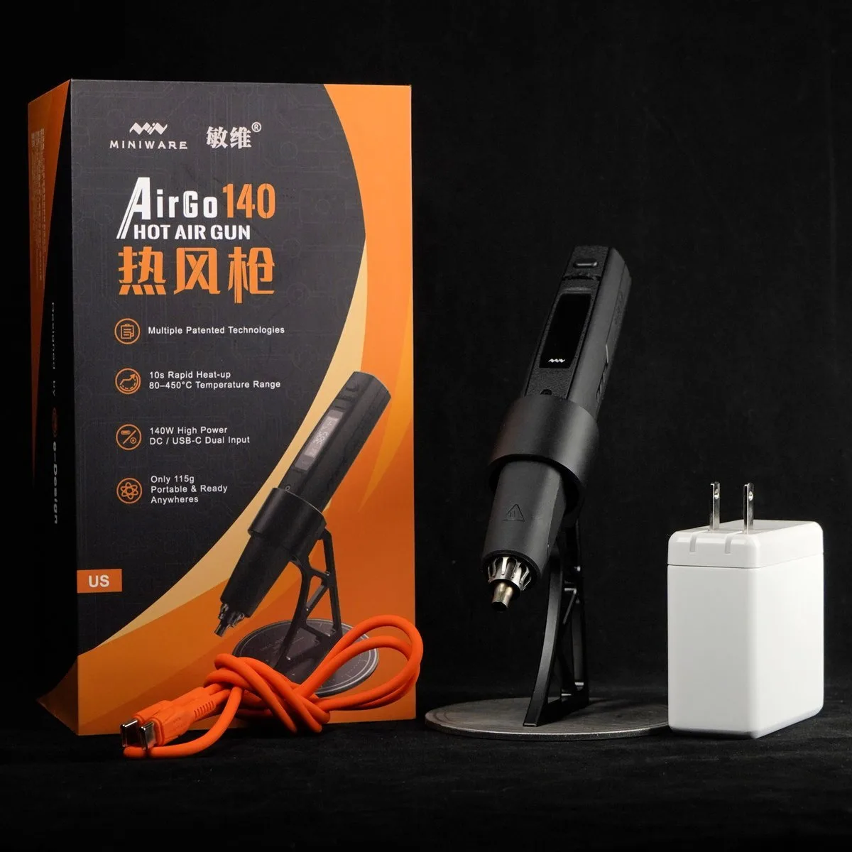 The AirGo 140 retail box with the gun, stand, and a white 140 W supply