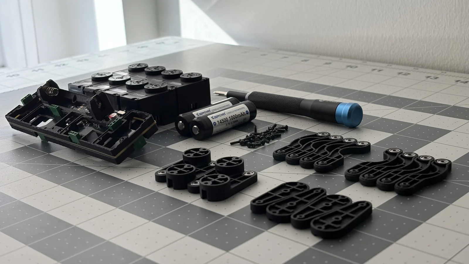 Q8botOne component kit laid out on a table