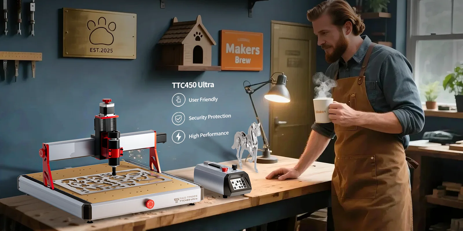 The TwoTrees TTC 450 Ultra in a home workshop, with a person in an apron nearby