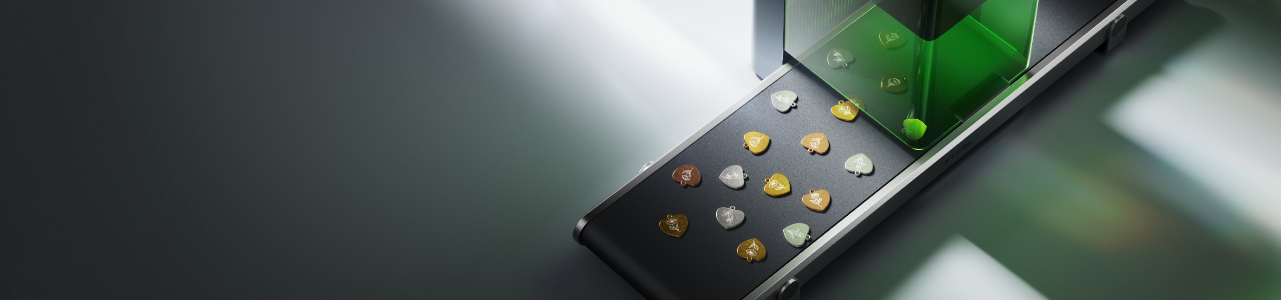 Small engraved metal pieces arranged on the F1 Ultra conveyor accessory