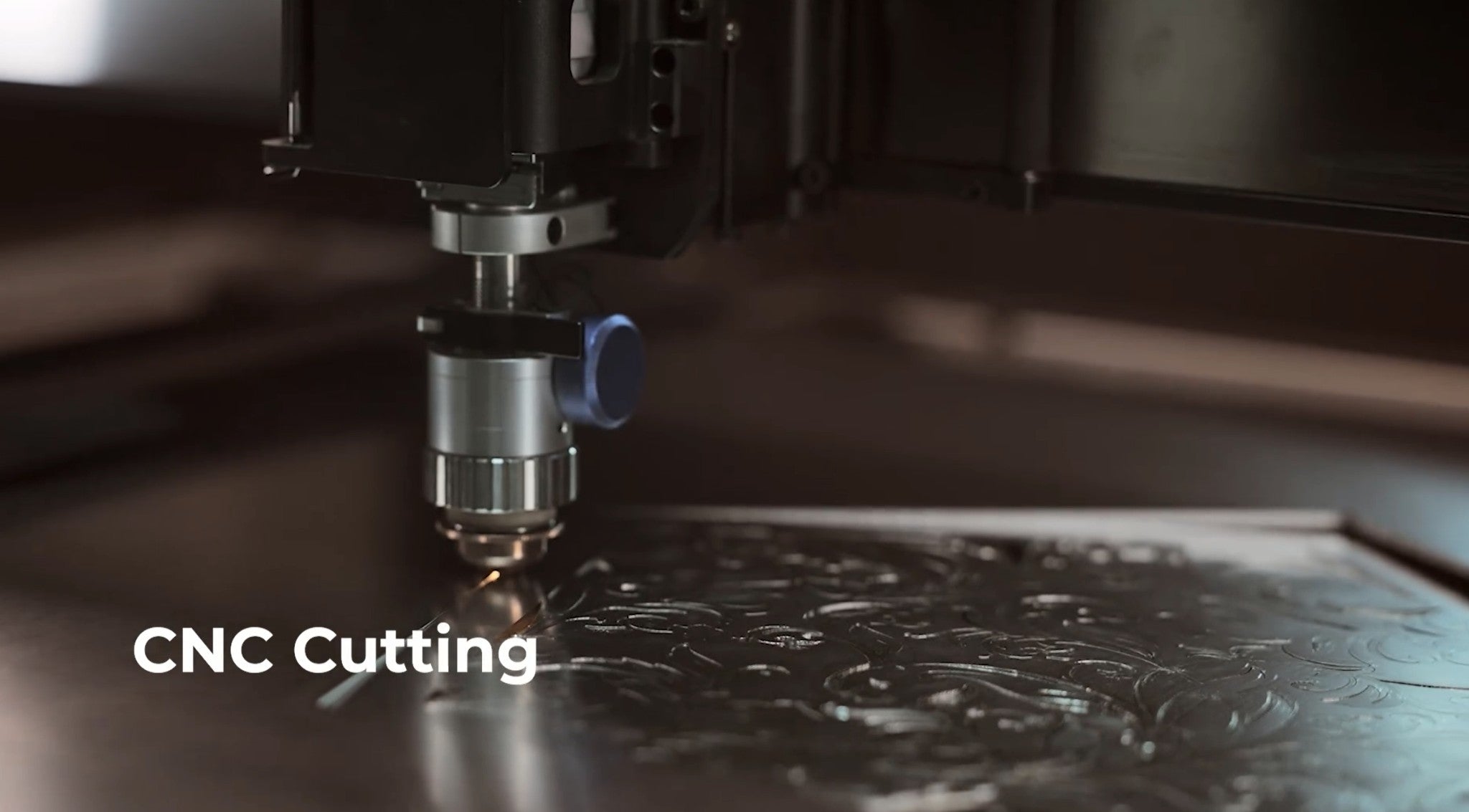 The xTool MetalFab CNC cutting head working over sheet metal