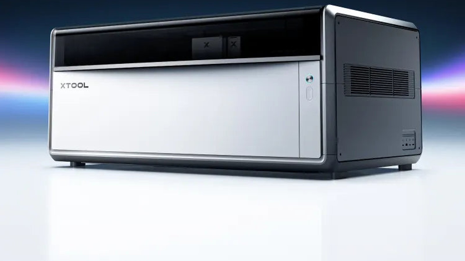 xTool X1 laser machine on a reflective white surface