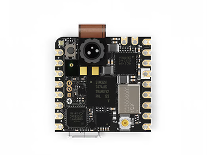 Photo of an Arduino Nicla Vision board, top-down view, showing its compact camera-ready form factor