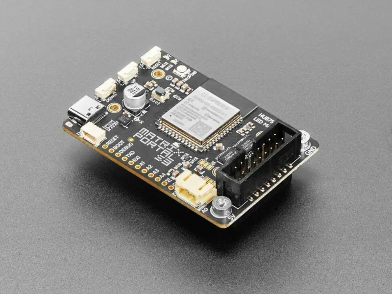 The black Adafruit MatrixPortal S3 controller board photographed from above