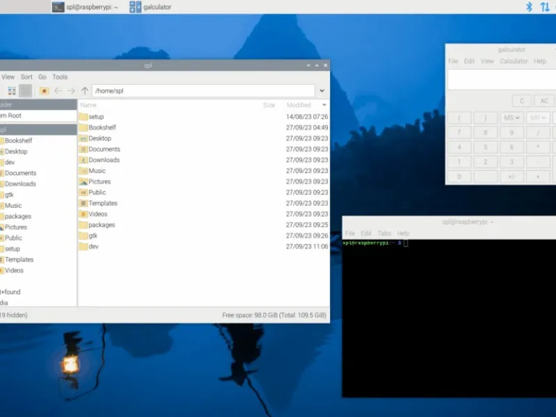 Raspberry Pi OS Bookworm desktop with file manager, terminal, and calculator windows