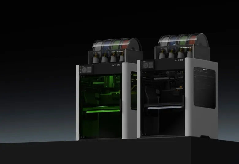 Bambu Lab H2D personal manufacturing machine shown with its laser and fabrication accessories