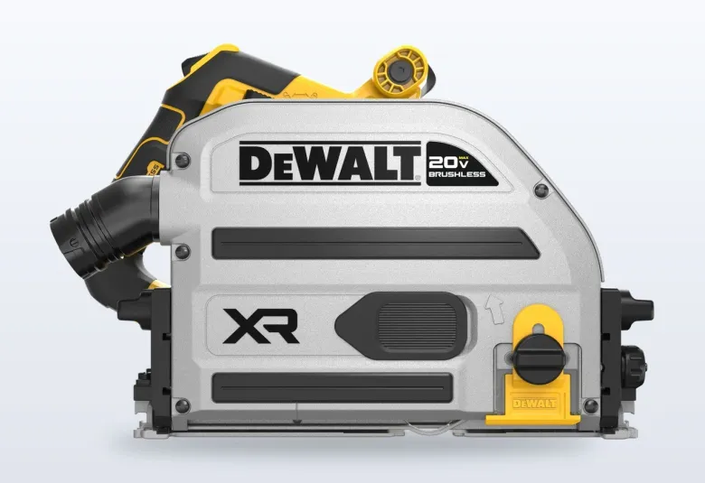 DeWalt 20V MAX XR plunge track saw on a guide rail cutting a sheet of plywood