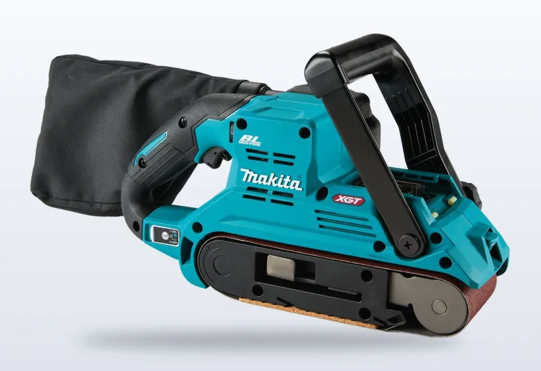 Makita 40V max XGT cordless belt sander with its black dust bag and large front handle