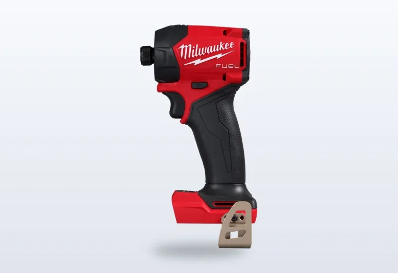Red and black Milwaukee M18 FUEL SURGE hydraulic driver against a black background