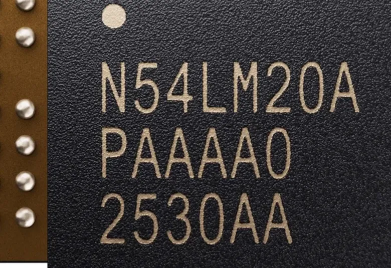 Close-up of the Nordic nRF54LM20A wireless chip in its CSP package