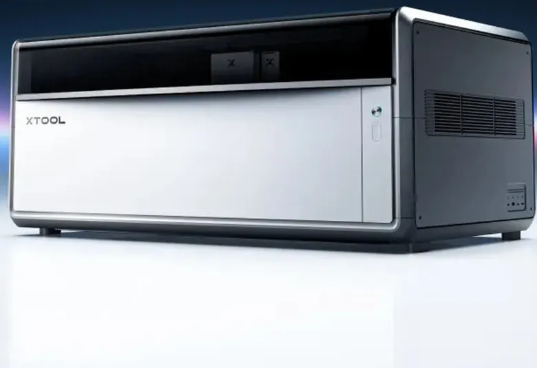 xTool X1 laser machine on a reflective white surface