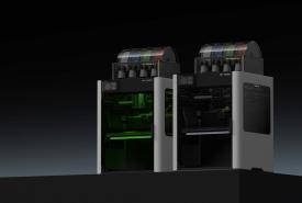 Bambu Lab H2D personal manufacturing machine shown with its laser and fabrication accessories