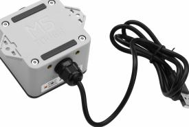 M5Stack ToughC5 controller in its gray enclosure with a cable attached