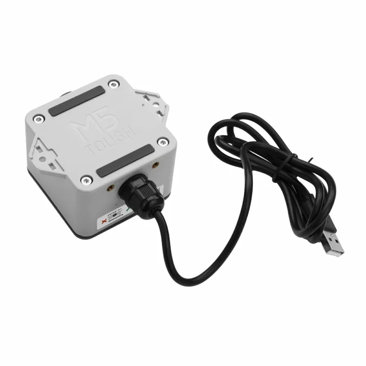 M5Stack ToughC5 controller in its gray enclosure with a cable attached
