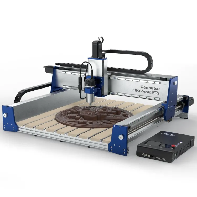 Fully assembled Genmitsu PROVerXL 2×2 CNC router with a blue and silver frame, a spindle above a slatted table holding a carved round relief, and the controller box at the front right