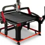 Arclight Arc Pro Ultra V3 4x4 CNC plasma table with black slat bed, red gantry risers, casters, and a monitor on a side pedestal