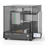 TwoTrees ED1 enclosed desktop CNC machine with a smoked glass cover, spindle and tool changer inside, a carved piece on the bed, and a touchscreen at the front right